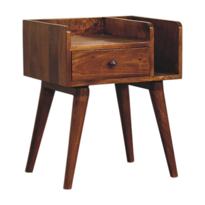 Solid wood bedside table featuring open storage slot, small drawer with brass knob, and Nordic-style wooden legs